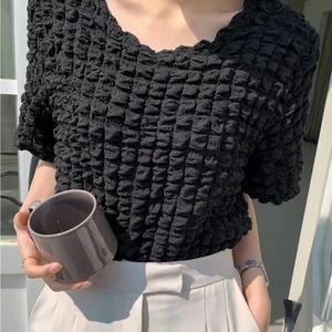 SHEIN black textured top. Never worn. Runs small.